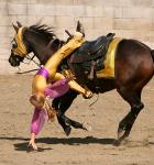 A girl in a vaulting training